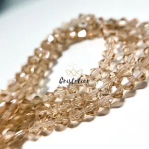Cristal Bicono Dorado Por Tira