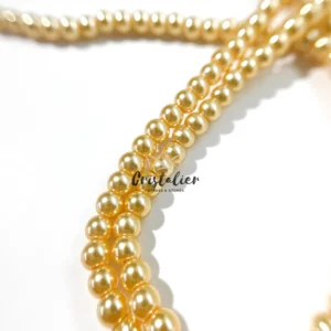 Perla de Vidrio por Tira Dorado