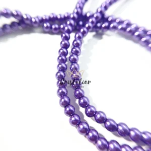 Perla de Vidrio por Tira Morado